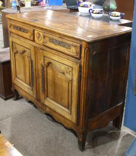 Appraisal: French Provincial walnut buffet French Provincial walnut buffet second half