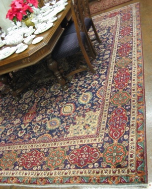 Appraisal: PERSIAN TABRIZ CARPET floral and central floral medallion type with