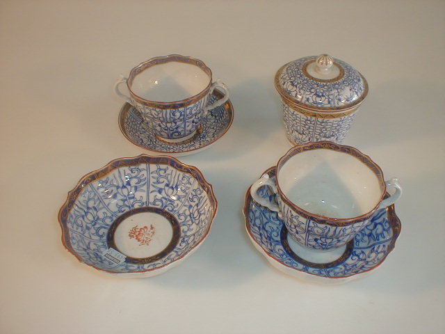 Appraisal: Two thC Caughley 'Lily' pattern chocolate cups with deep saucers