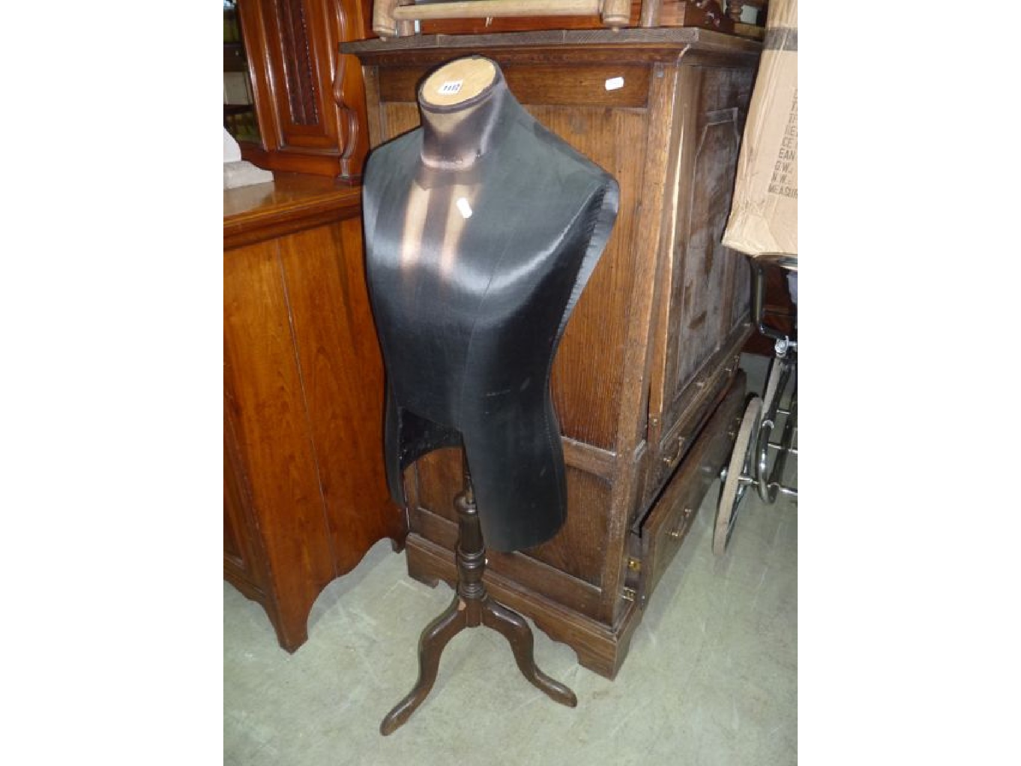 Appraisal: A tailors dummy mannikin torso raised on a low stand