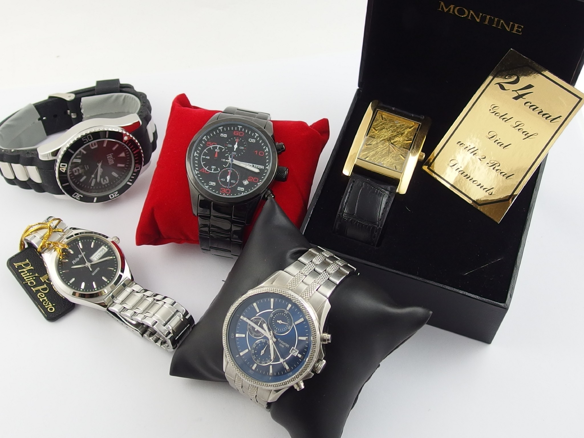 Appraisal: A collection of five gents watches in original boxes to