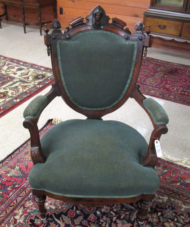 Appraisal: VICTORIAN SHIELD-BACK ARMCHAIR Renaissance Revival style American c having a