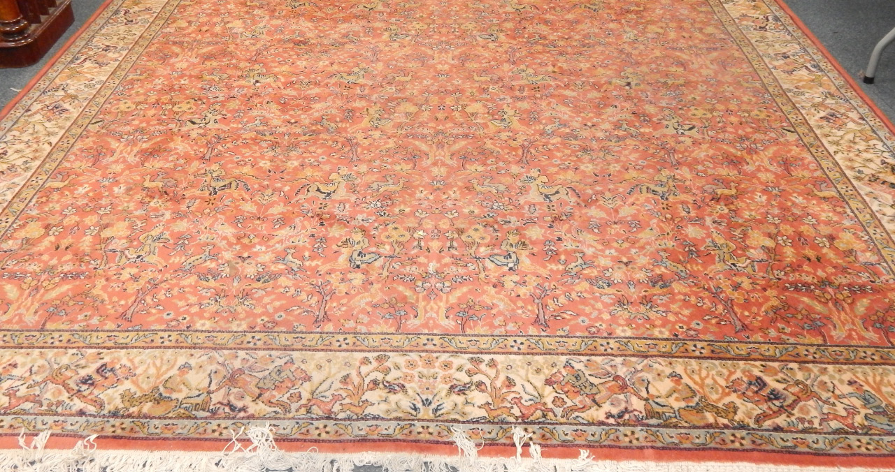 Appraisal: A Kashan wool rug decorated with hunting scenes against a