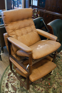 Appraisal: PAIR OF TAN LEATHER EASY CHAIRS