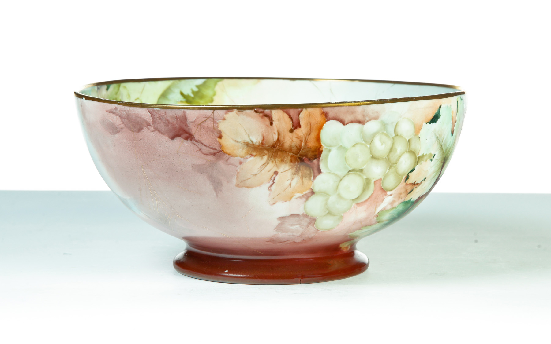 Appraisal: HAND PAINTED PUNCH BOWL Germany ca Grape foliage and spider