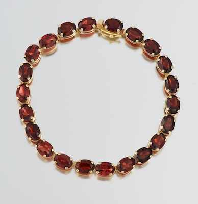 Appraisal: A Ladies' Garnet Bracelet k yellow gold bracelet set with