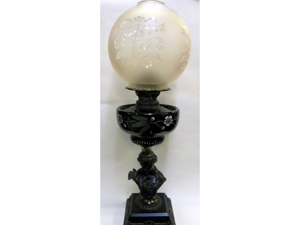 Appraisal: Victorian oil lamp the base with bust supporting and black