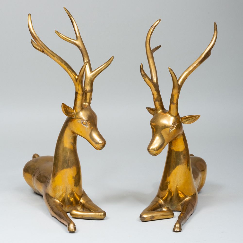 Appraisal: Pair of Indian Brass Recumbent Stags x x in Property