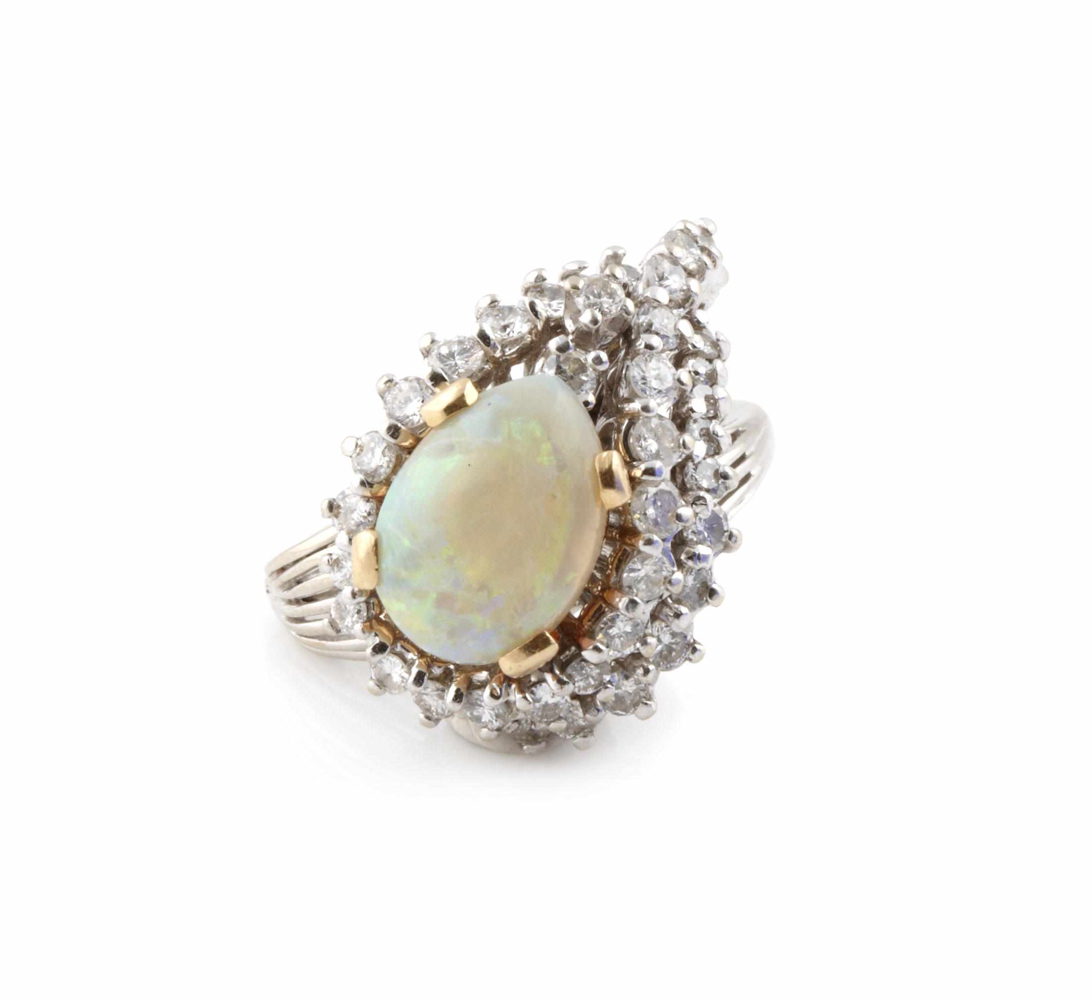 Appraisal: An opal diamond and k white gold ring size