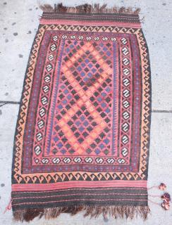 Appraisal: Kilim Rug Geometric patterns in deep reds oranges browns and