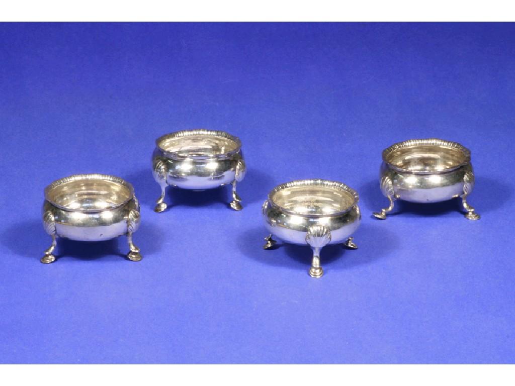 Appraisal: A SET OF FOUR GEORGE III SALTS of cauldron form