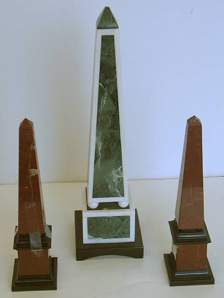 Appraisal: A pair of French rouges marble and black slate obelisks