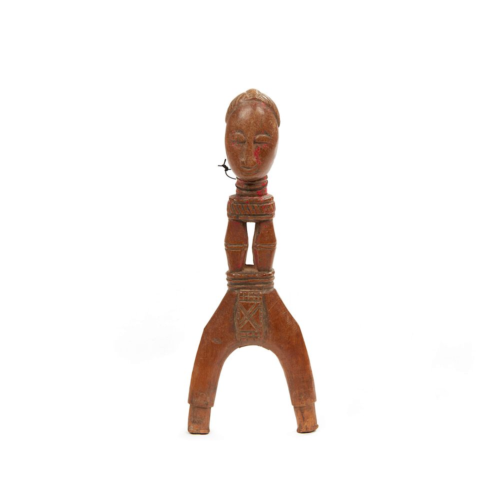 Appraisal: Baule Slingshot Baule wood slingshot with human head depicted at