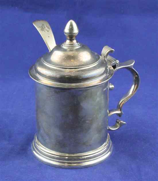 Appraisal: A 's Irish silver drum mustard with scroll handle domed