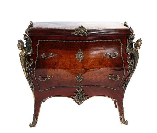 Appraisal: A Louis XV style two drawer commode with marble top