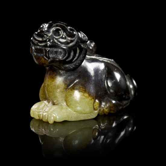 Appraisal: A Chinese Black and Yellow Jade Toggle of a Beast