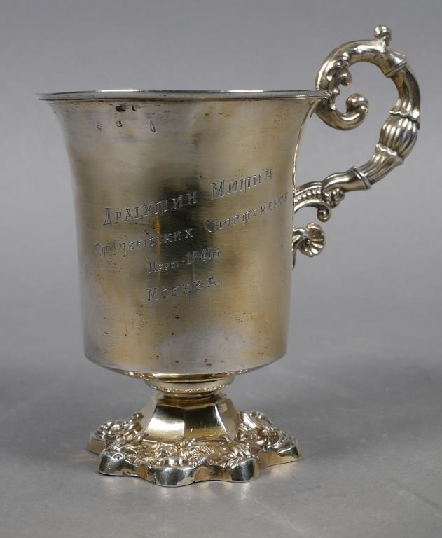 Appraisal: RUSSIAN SILVER TROPHY CUPHandled and footed Russian silver presentation cup