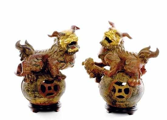 Appraisal: Pair Chinese painted cast-iron Foo lions th century mythical guardians