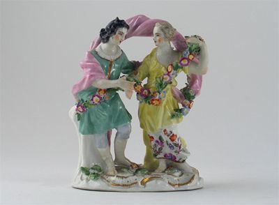 Appraisal: A Meissen figural group of a young couple draped with