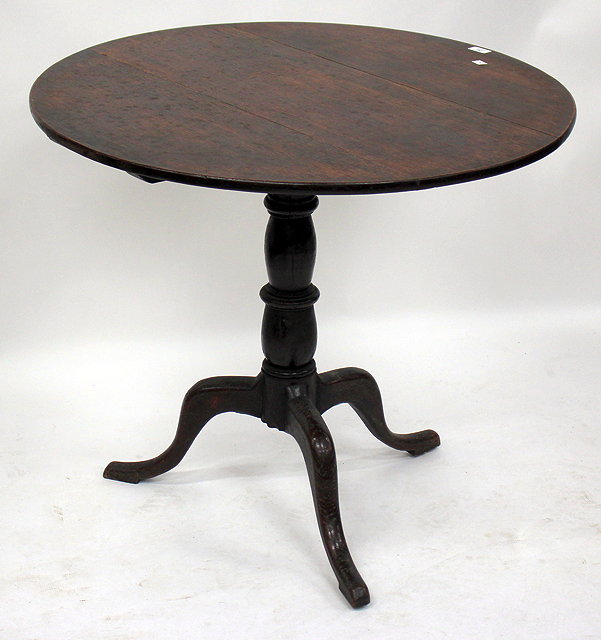 Appraisal: A GEORGIAN OAK TILT TOP TRIPOD TABLE the top cm