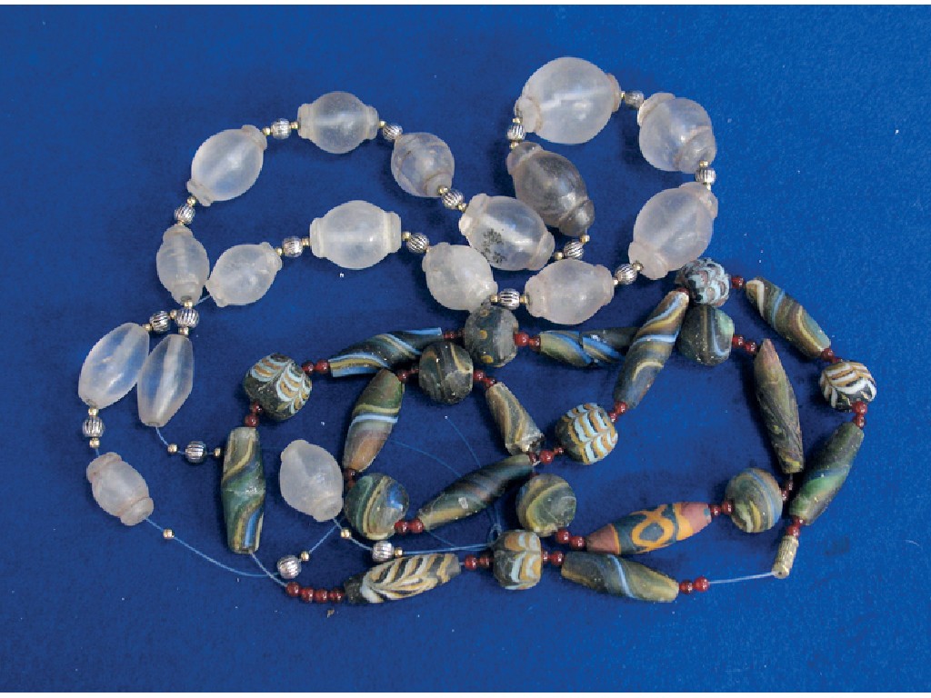 Appraisal: AN EASTERN ROCK CRYSTAL GRADUATED BEADED NECKLACE each bead interspersed