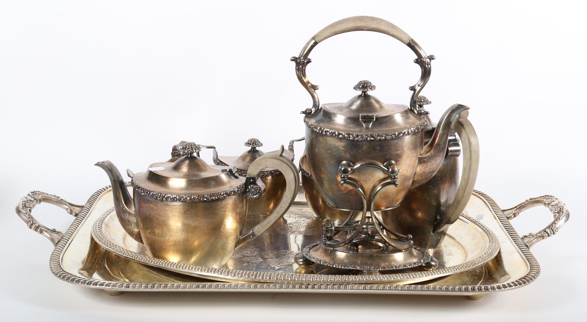 Appraisal: Six-piece silver plated tea set with two trays Undernumber