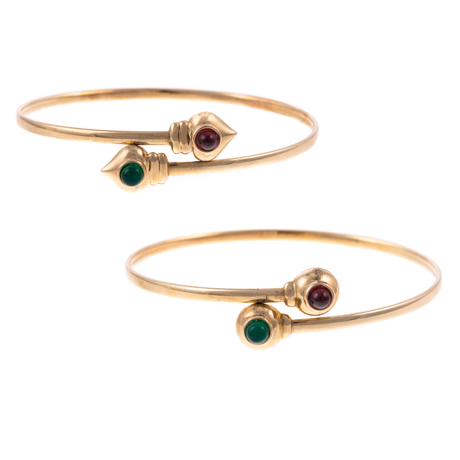 Appraisal: A MATCHED PAIR OF GEMSTONE BYPASS BANGLES IN K Two