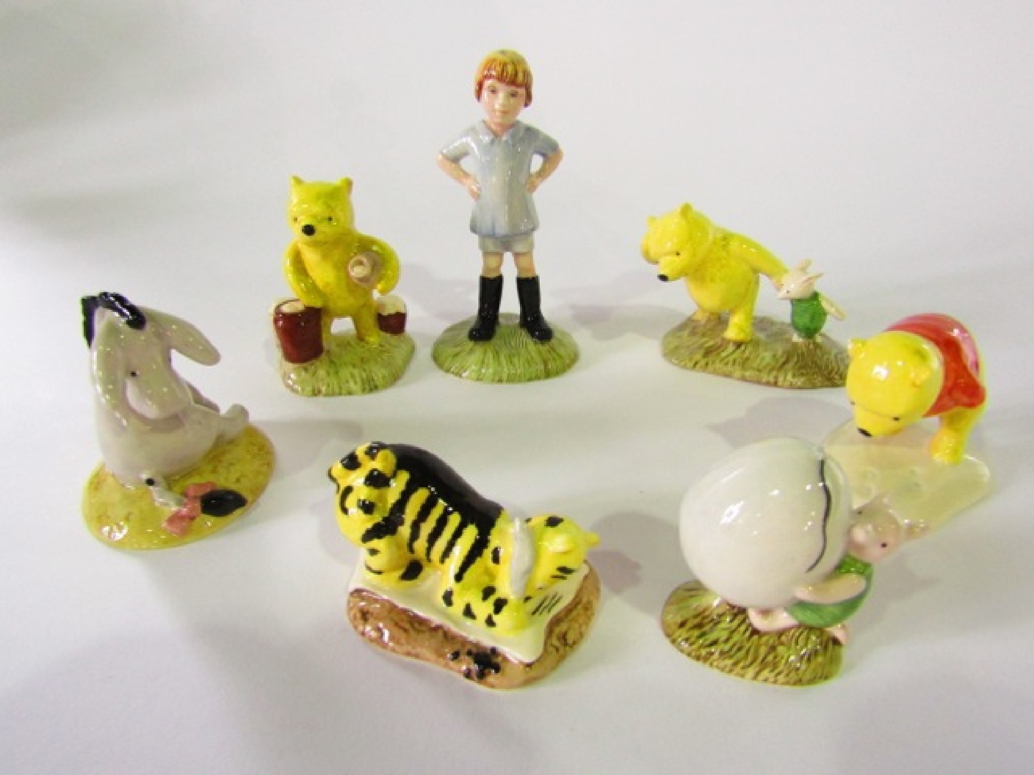 Appraisal: A collection of Royal Doulton figures from the Winnie the