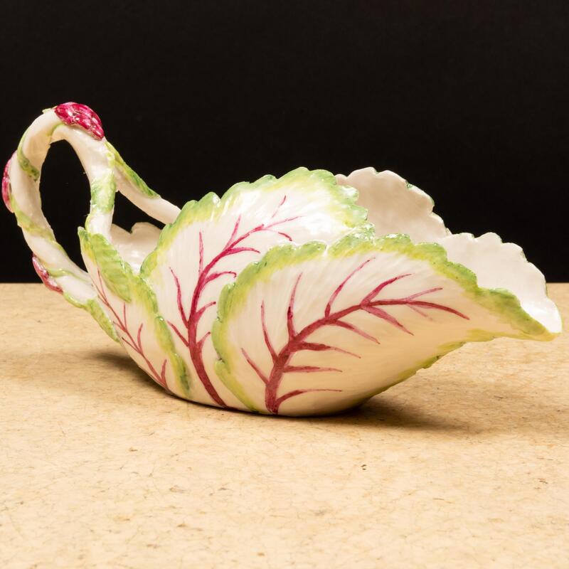 Appraisal: Lady Anne Gordon Porcelain Radicchio Sauce Boat Black monogram mark