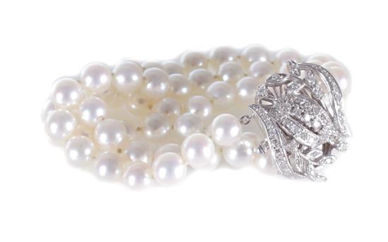 Appraisal: Vintage Baden Foss diamond and pearl bracelet triple strand mm