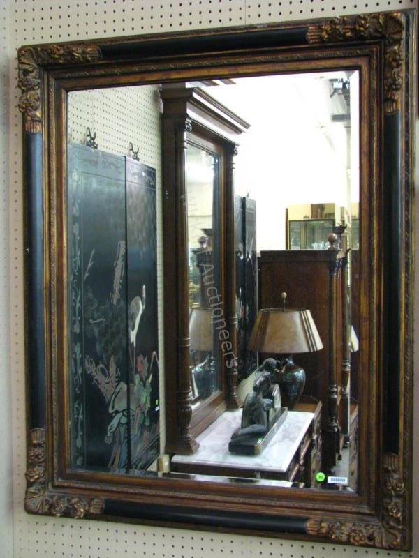 Appraisal: Antique style decorator-quality wall mirror beveled glass with black and