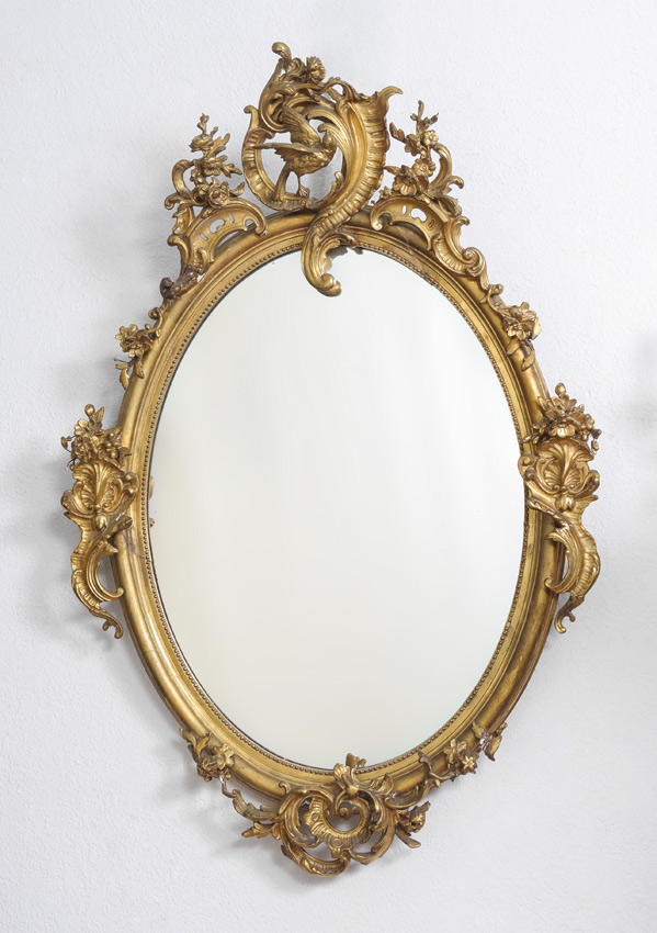 Appraisal: EARLY GILT WOOD GESSO OVAL MIRROR Rococo style bird in