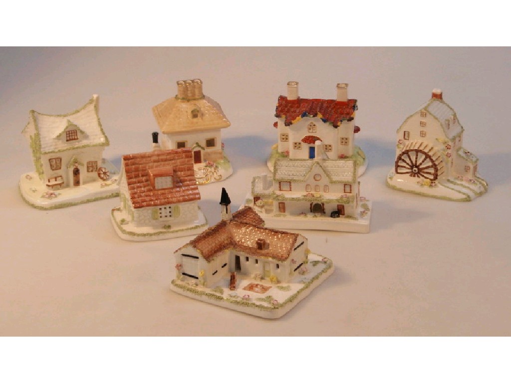 Appraisal: Seven Coalport reproduction pastille burners modelled as buildings including Little