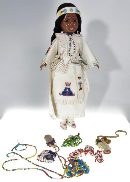 Appraisal: A vintage Native American doll with beaded accessories composition body