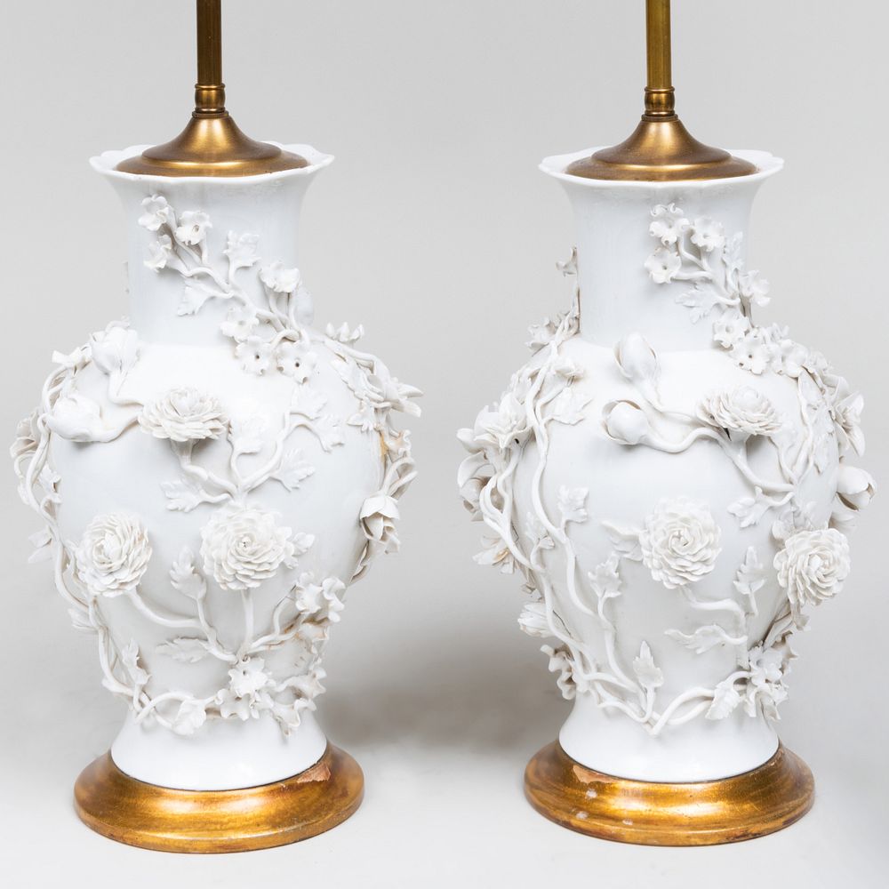 Appraisal: Pair of White Glazed Flower Encrusted Porcelain Vases Mounted as