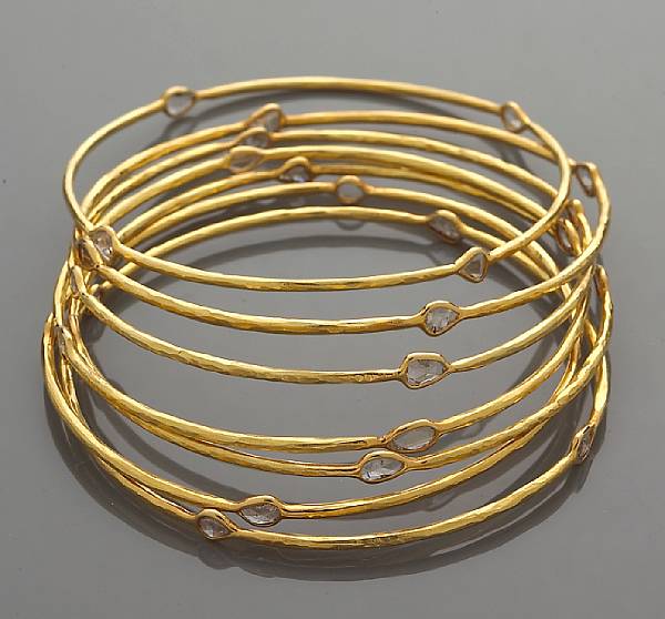 Appraisal: A set of seven diamond bangle bracelets each set with