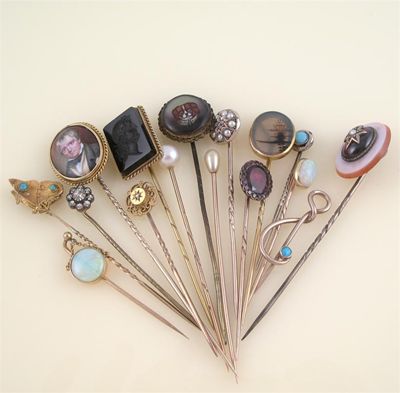 Appraisal: Fifteen assorted gold stick pins one mounted with a gold