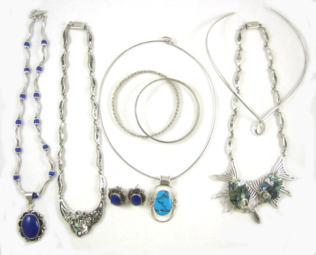 Appraisal: NINE STERLING SILVER ARTICLES OF JEWELRY having turquoise mother of