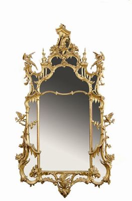 Appraisal: A Chippendale style giltwood and gesso pier mirror elaborately carved