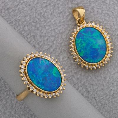 Appraisal: K GOLD DIAMOND AND BLACK OPAL DOUBLET SUITE Oval pendant