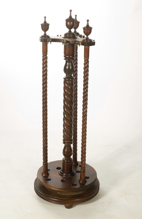 Appraisal: th CENTURY MAHOGANY CUE STAND the tri-form platform top supporting