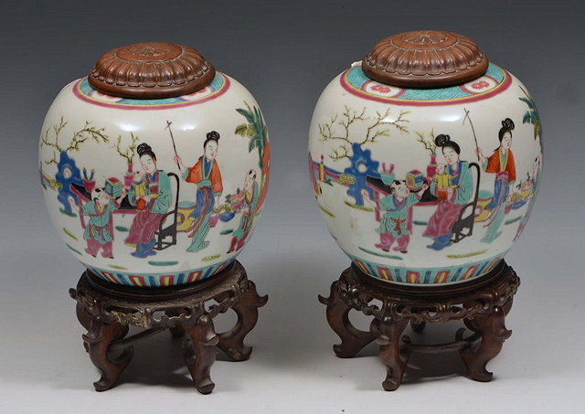 Appraisal: A PAIR OF CHINESE POLYCHROME OVOID VASES decorated with figures