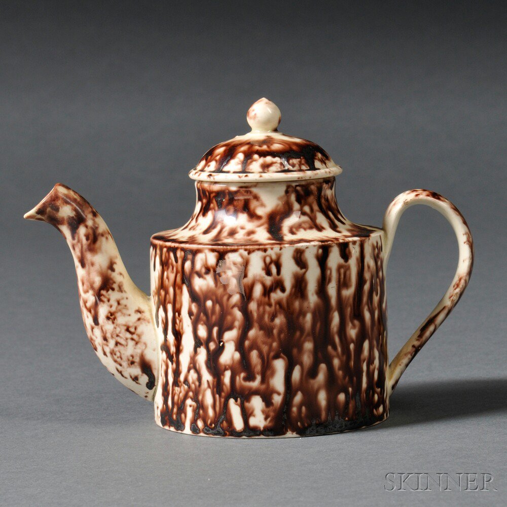 Appraisal: Staffordshire Cream-colored Earthenware Teapot and Cover England c cylindrical shape