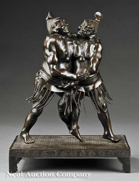 Appraisal: A Japanese Bronze Figural Group of Two Sumo Wrestlers probably