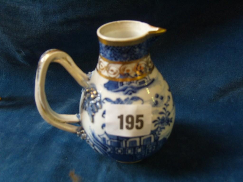 Appraisal: An th century blue and white jug of ovoid form