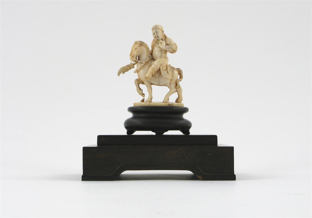 Appraisal: A small Chinese ivory carving of an equestrian