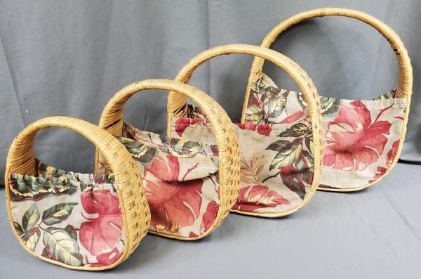 Appraisal: Set of four vintage baskets with fabric measurements range from