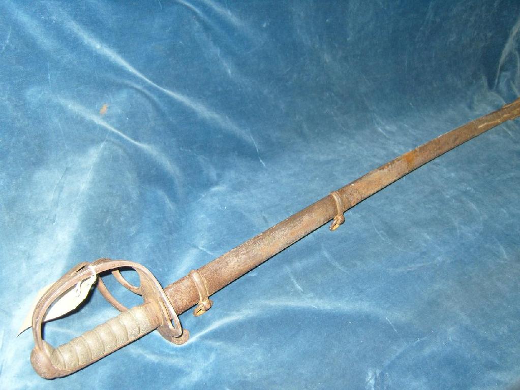 Appraisal: A Victorian cavalry sword and scabbard pattern with engraved detail