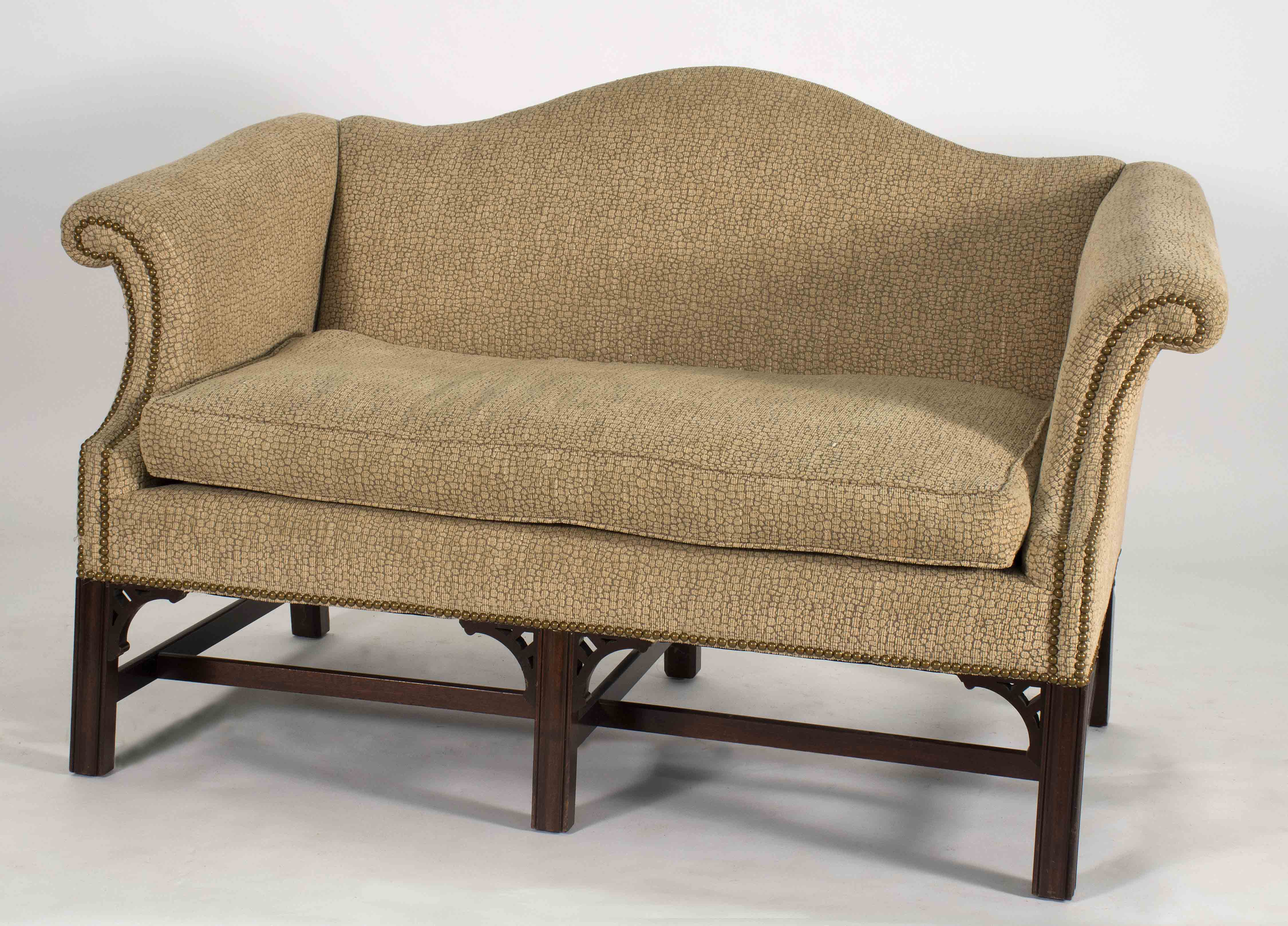 Appraisal: CHIPPENDALE-STYLE CAMELBACK LOVE SEAT Faux reptile-hide upholstery Reeded legs Height