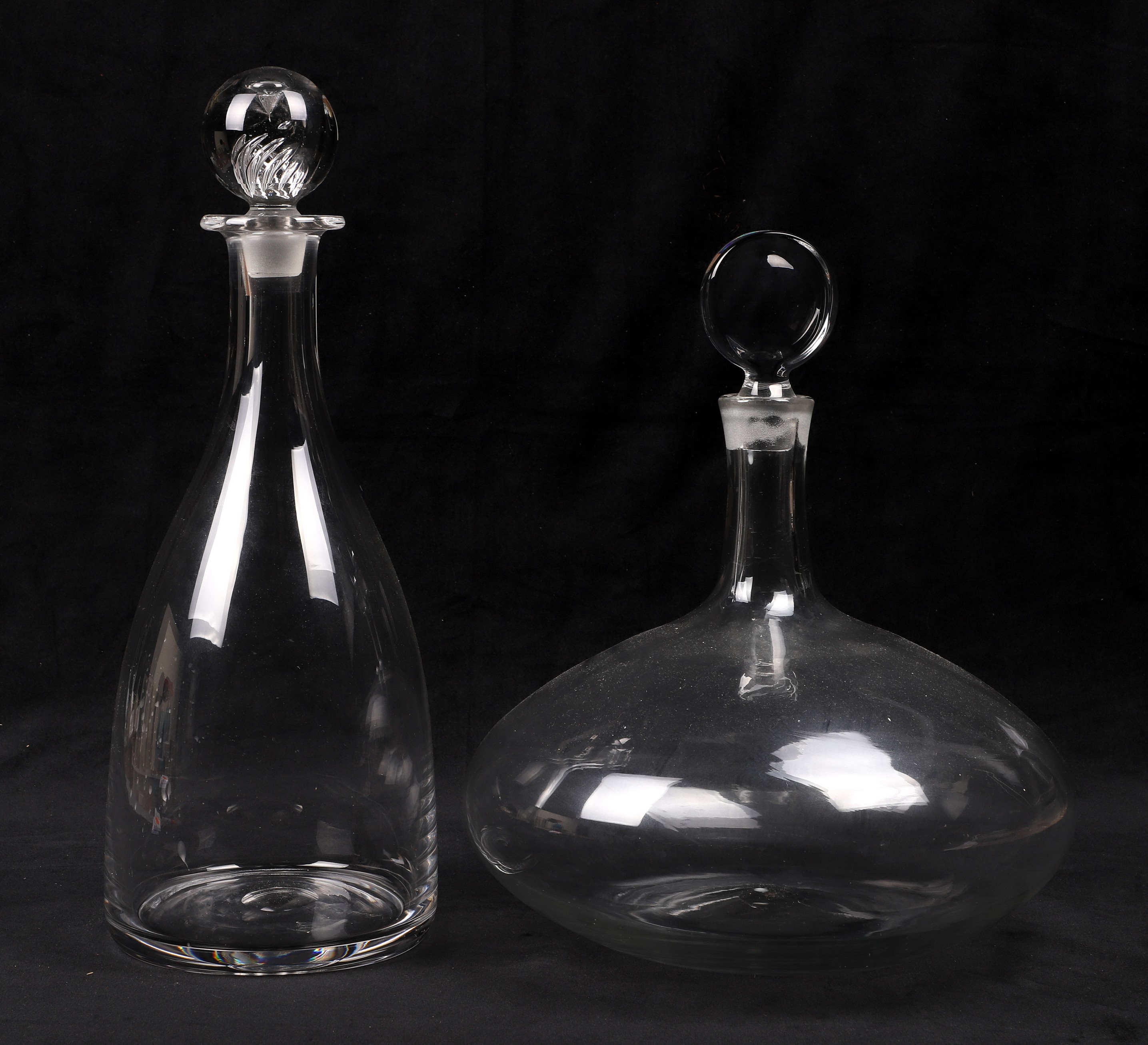 Appraisal: Oversized blown glass decanters H and - H